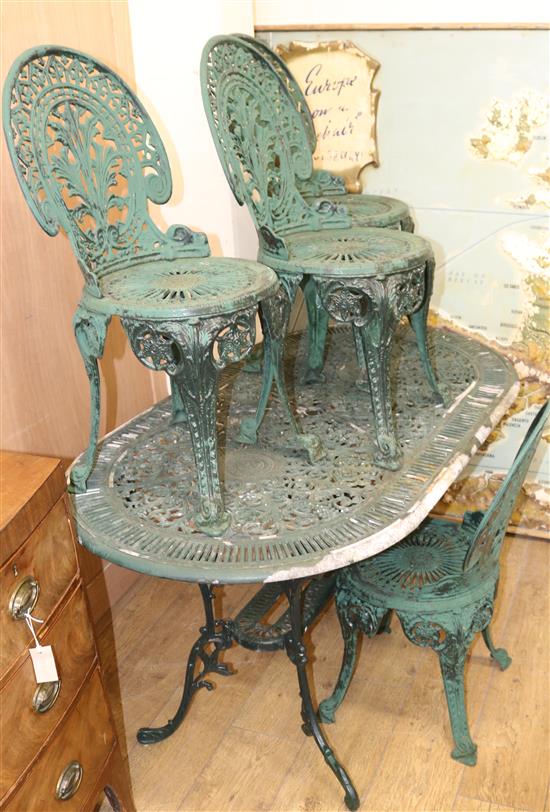 A garden table and four chairs W.138cm